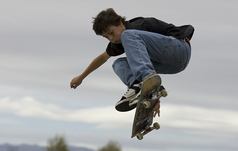 Boy Performing Skateboard Trick