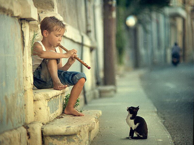 Boy Playing Flute — Brown
