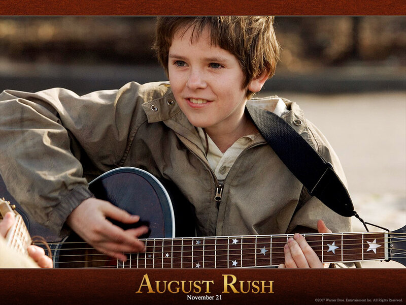 Boy Playing Guitar — Brown