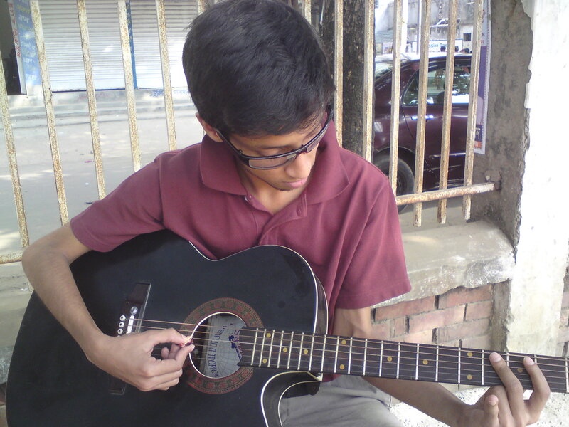 Boy Playing Guitar