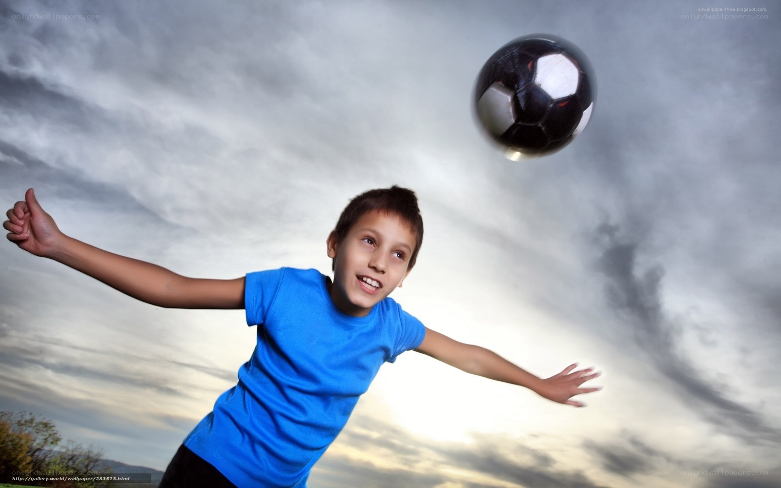 boy playing with soccer ball