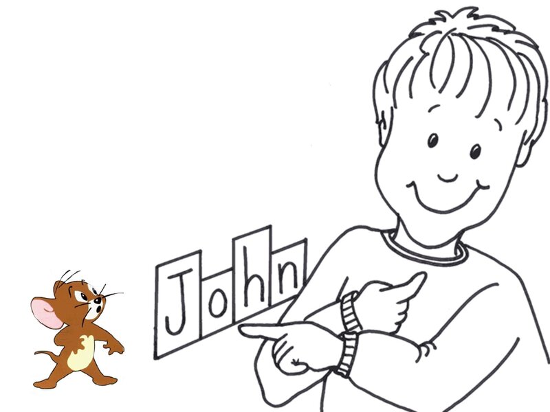 Boy Pointing at Name Blocks