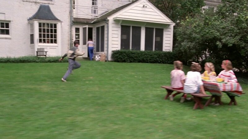 Boy Running on Lawn