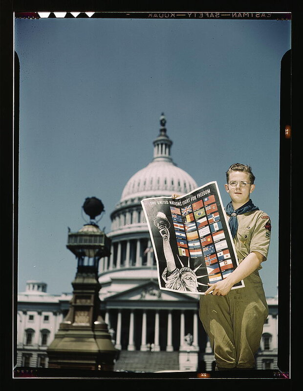 Boy Scout with United Nations poster