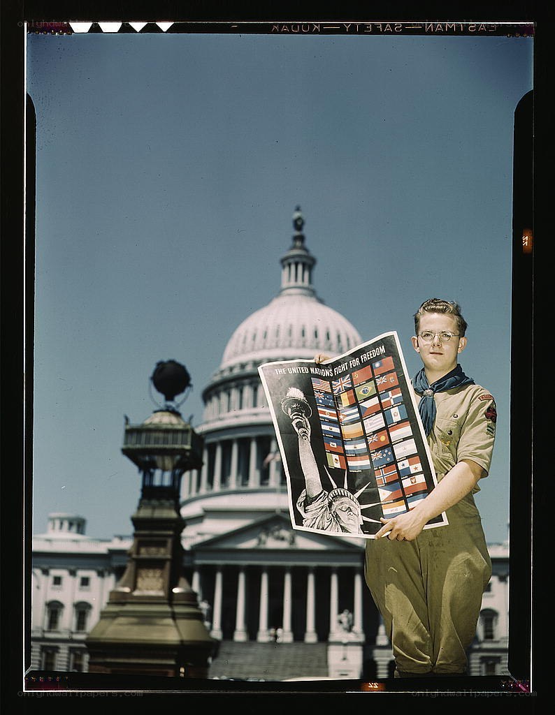 Boy Scout with United Nations poster