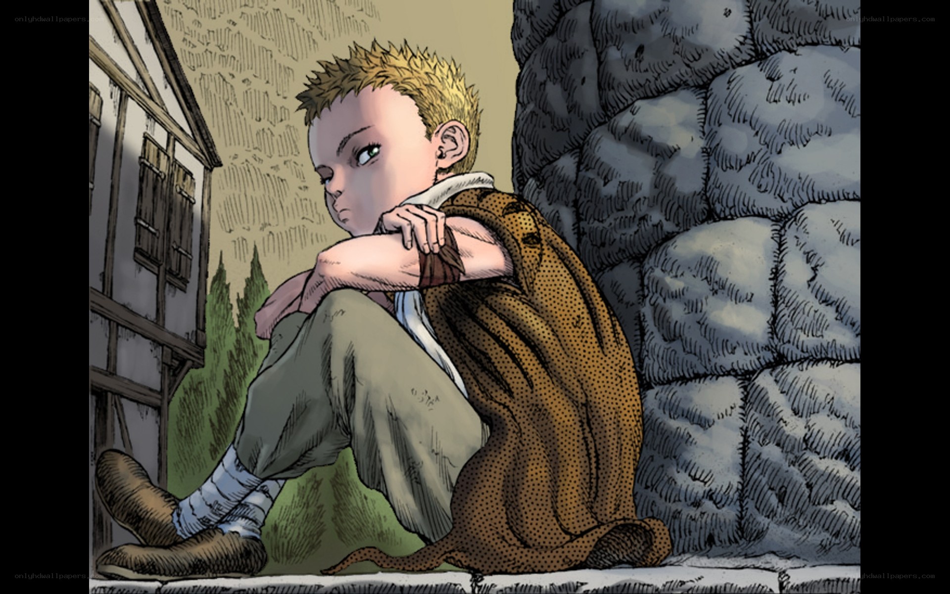 boy sitting against wall