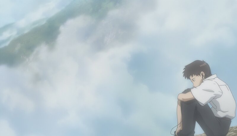 boy sitting on a cliff