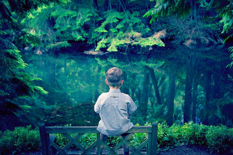 Boy Sitting on Bench