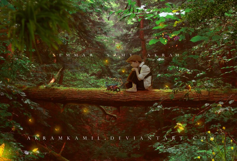 Boy Sitting on Log