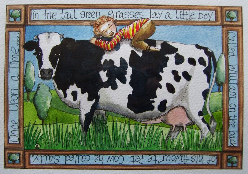 boy sleeping on cow