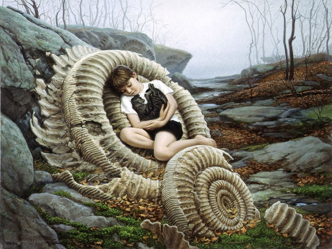 Boy sleeping with cat in fossil