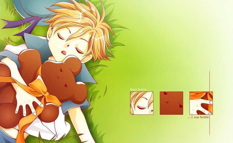 Boy sleeping with teddy bear