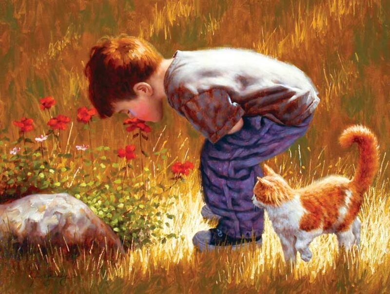 Boy Smelling Flowers