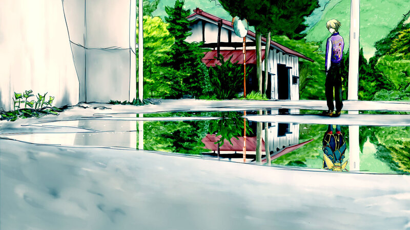 boy standing by a puddle