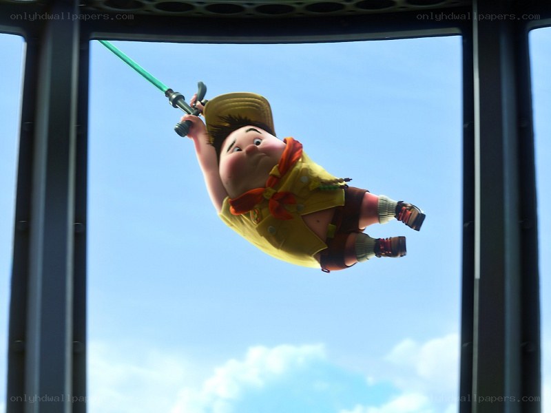 boy swinging on rope