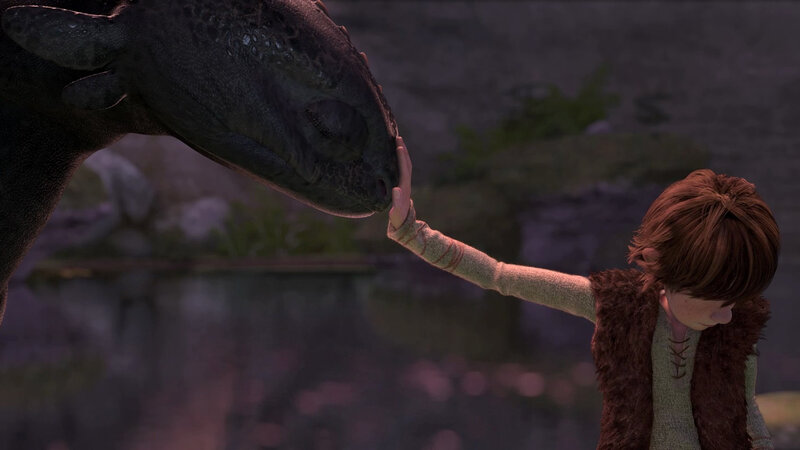 boy touching dragon's snout