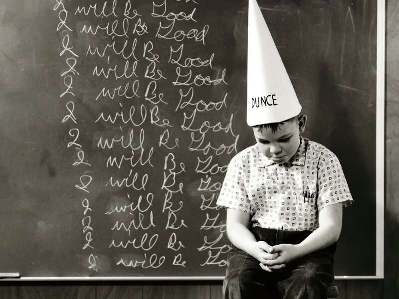 Boy Wearing Dunce Hat