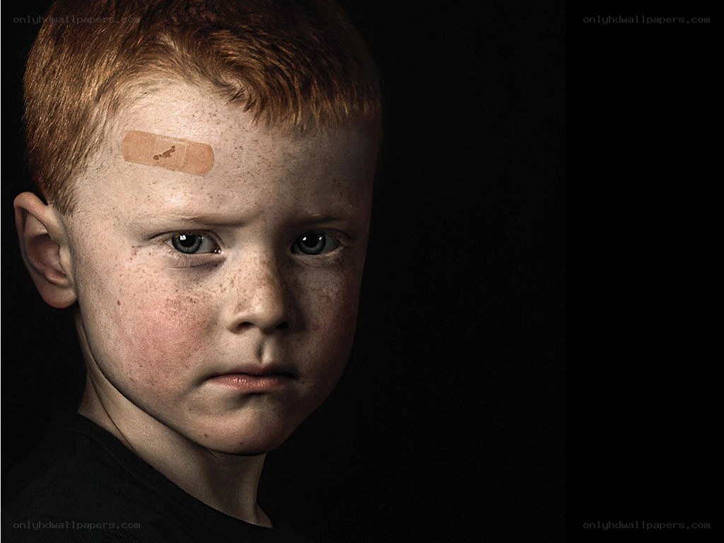 boy with bandage on forehead