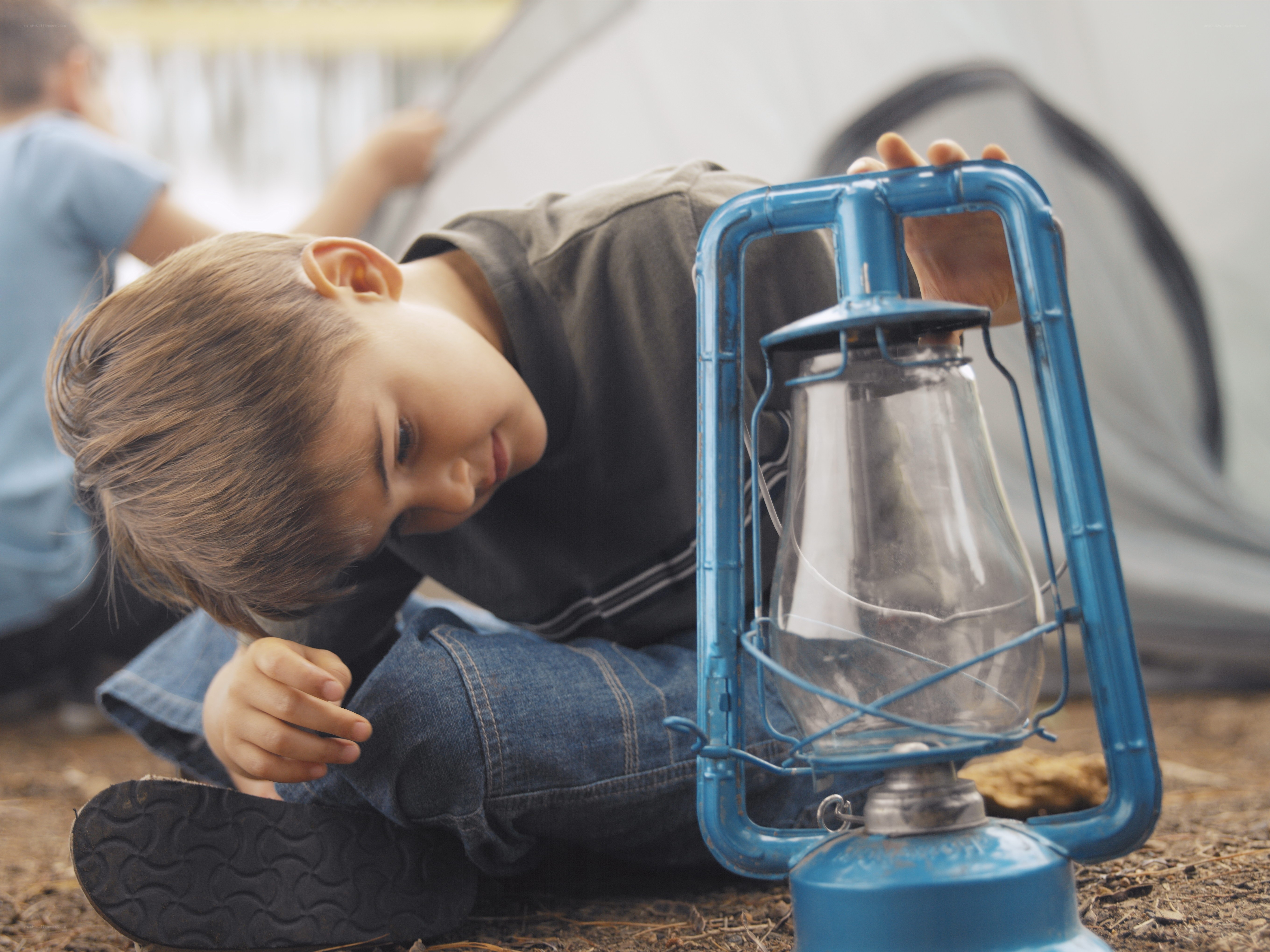 Boy with camping lantern