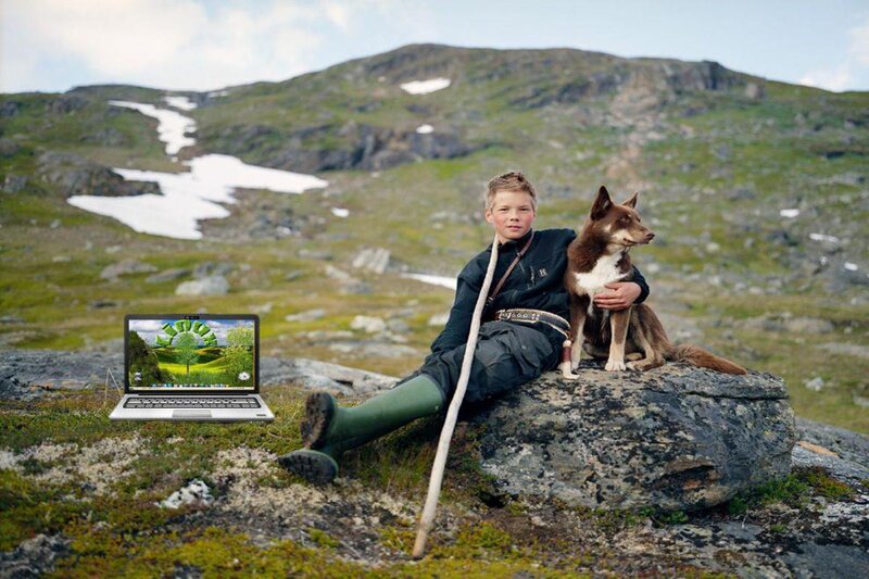 Boy with Dog on Rock