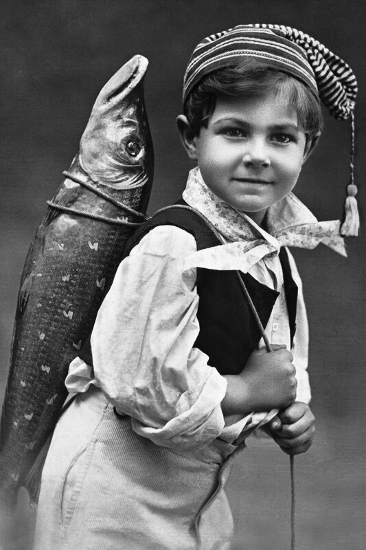 Boy with fish on his back