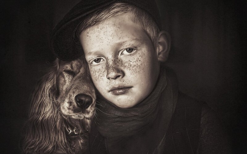 Boy with Freckles and Dog