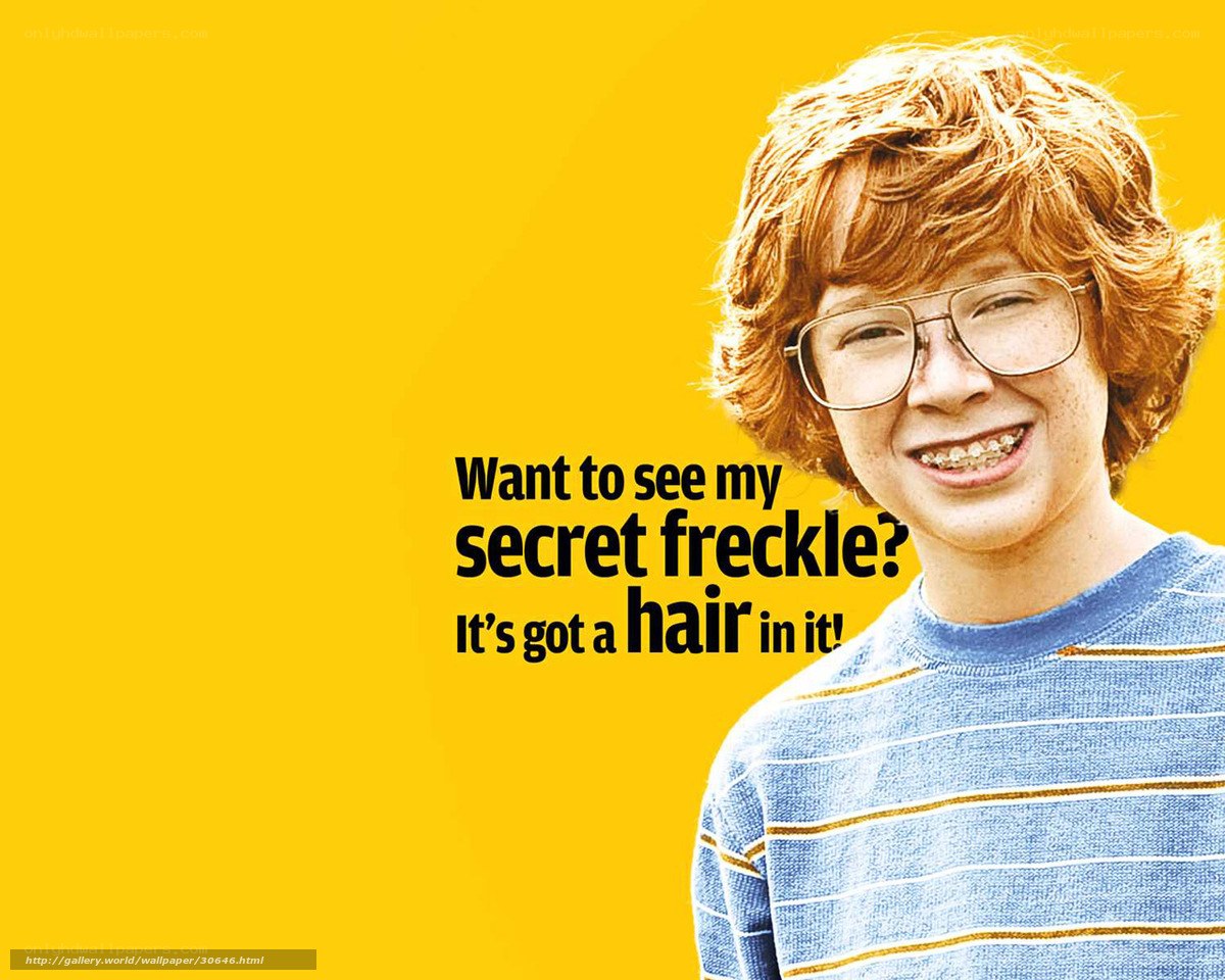 boy with freckles and glasses