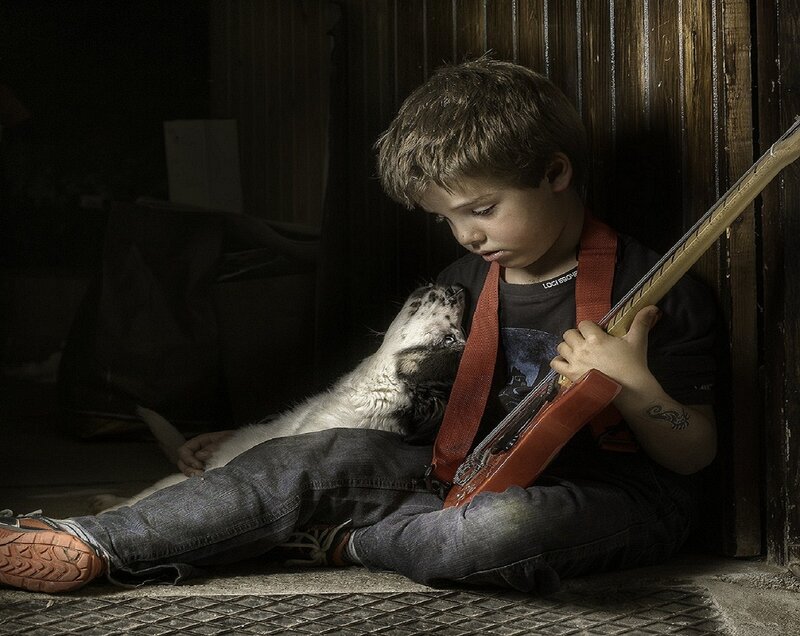 Boy with Guitar and Dog