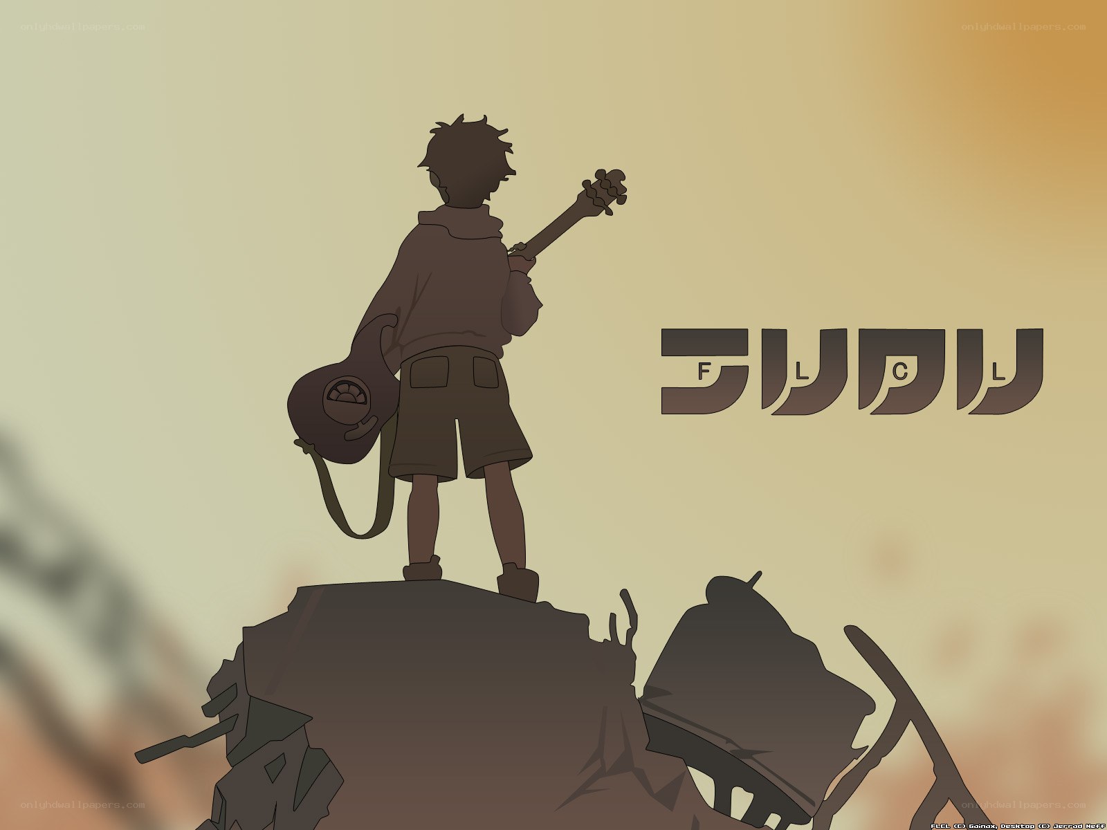 boy with guitar on ruins