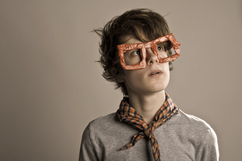 boy with makeshift glasses
