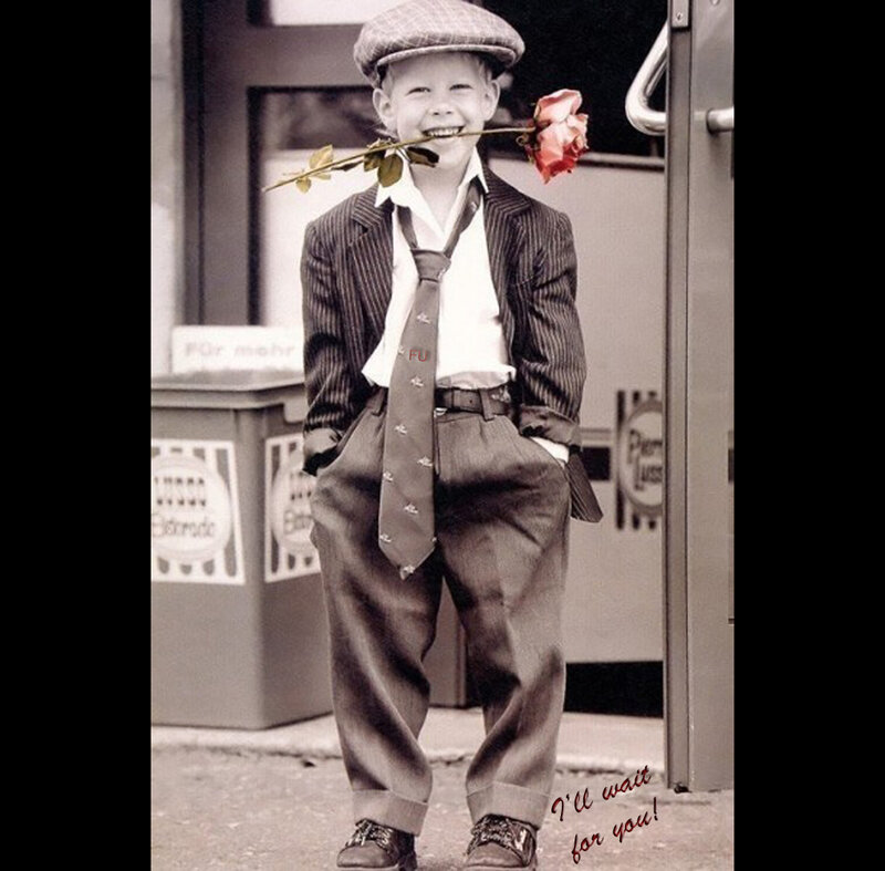 Boy with rose in his mouth