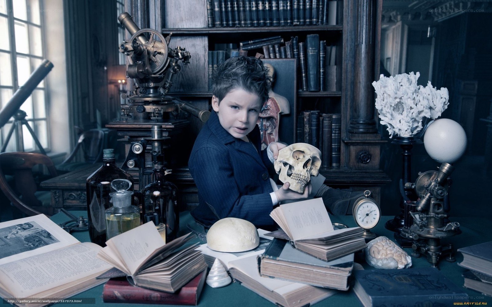 boy with skull in study