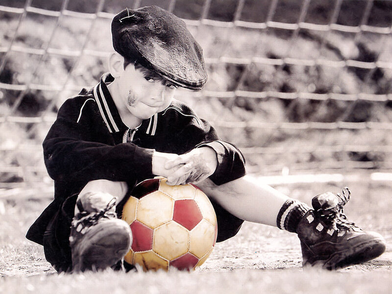 Boy with Soccer Ball