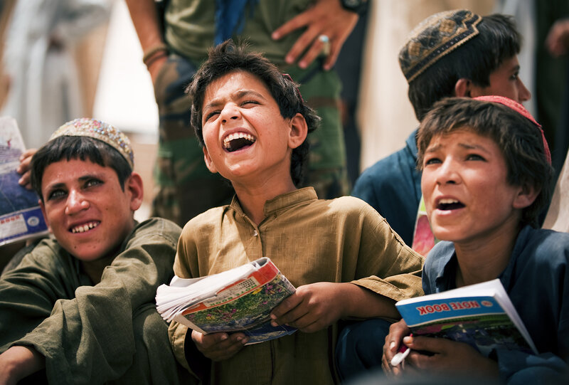 Boys Laughing in Crowd