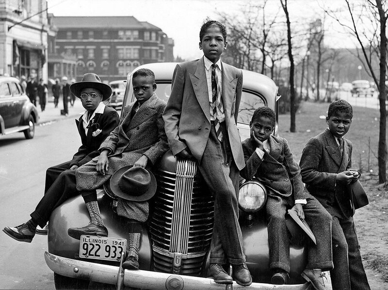 Boys on a car hood