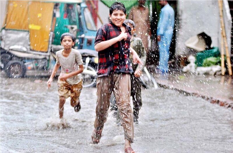 Boys Playing in Rain