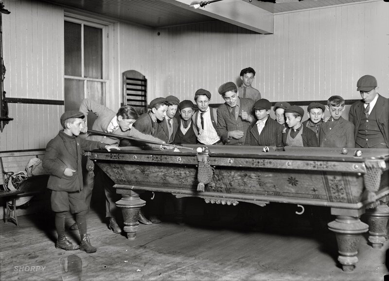 Boys playing pool