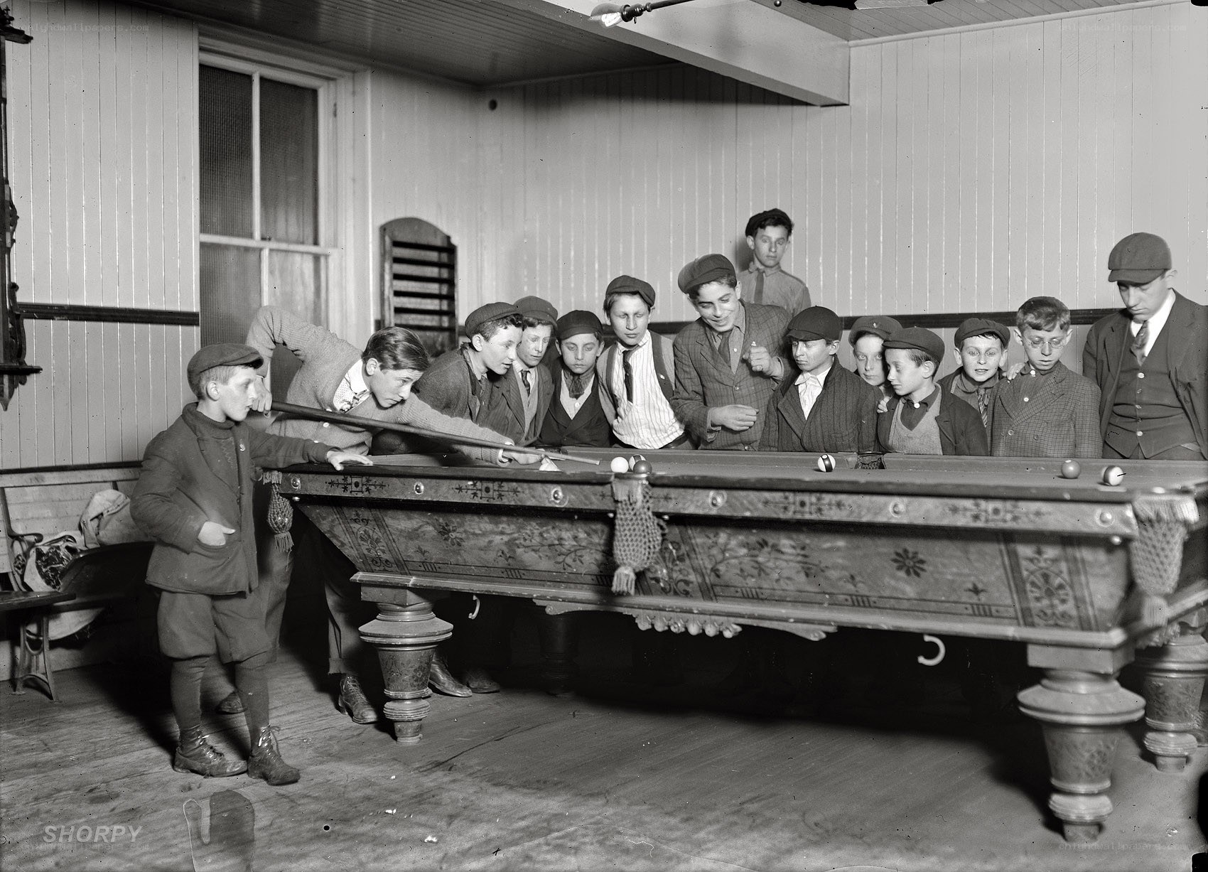Boys playing pool