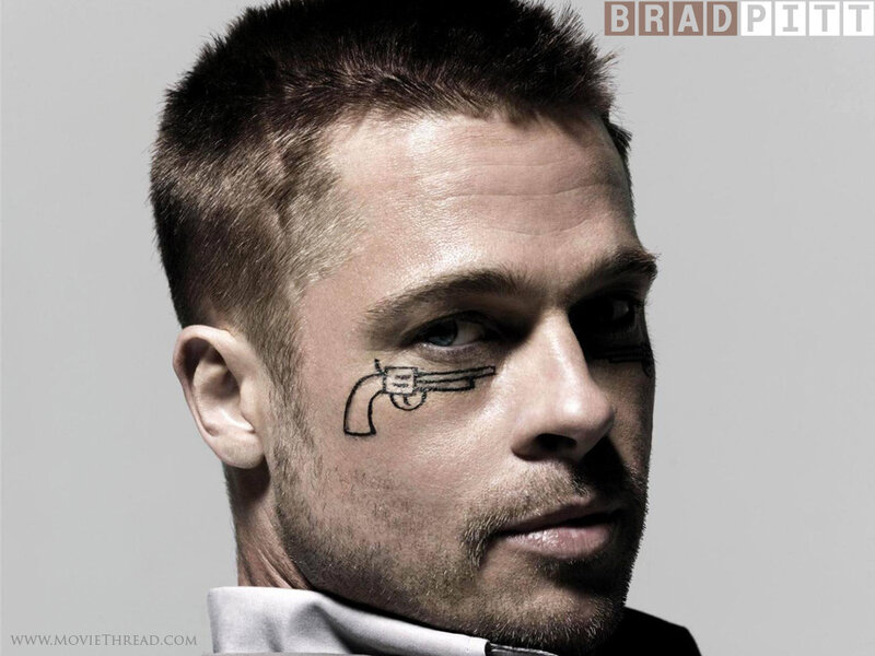 Brad Pitt with gun tattoo