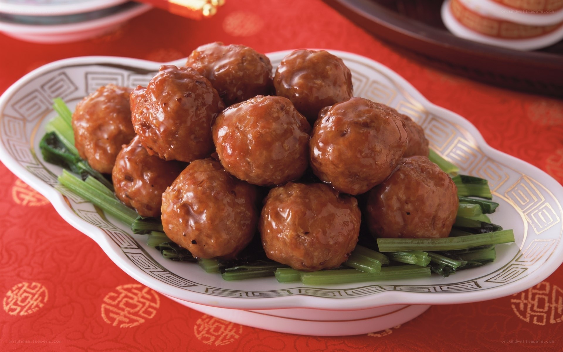 Braised meatballs on greens