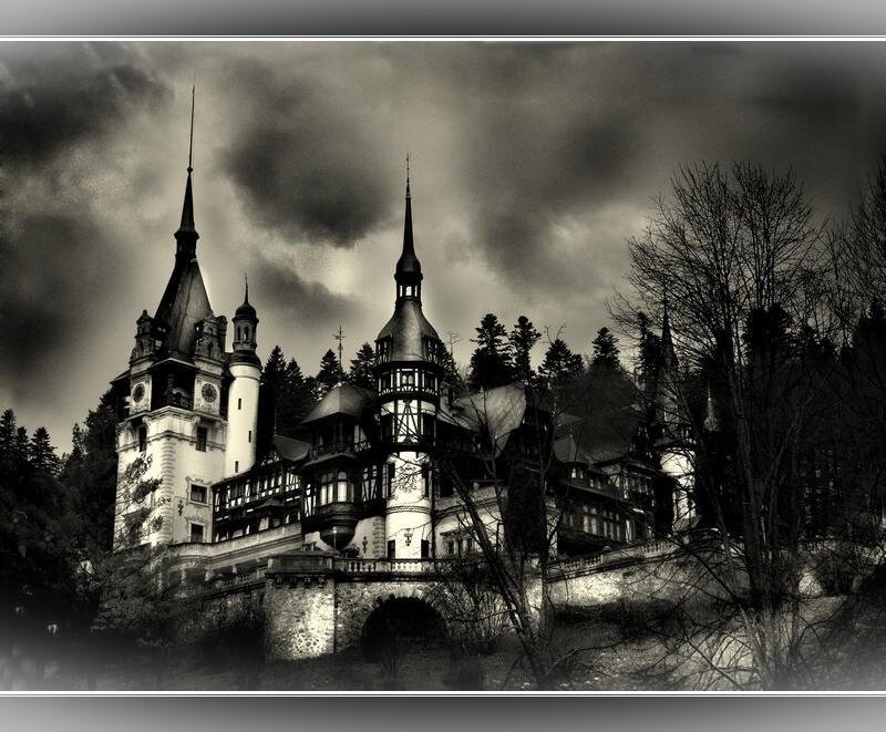 Bran Castle under stormy sky