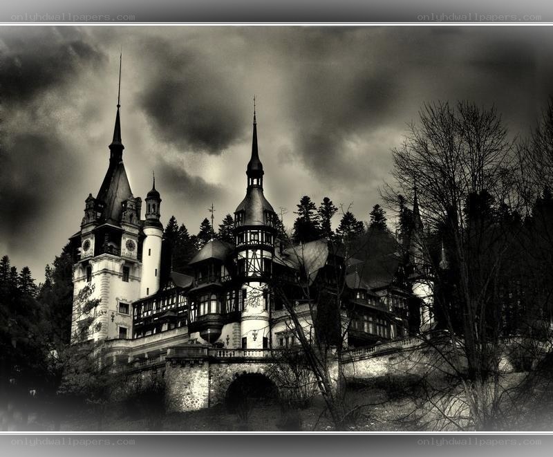 Bran Castle under stormy sky