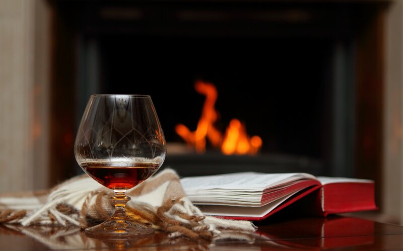 Brandy Glass by Fireplace