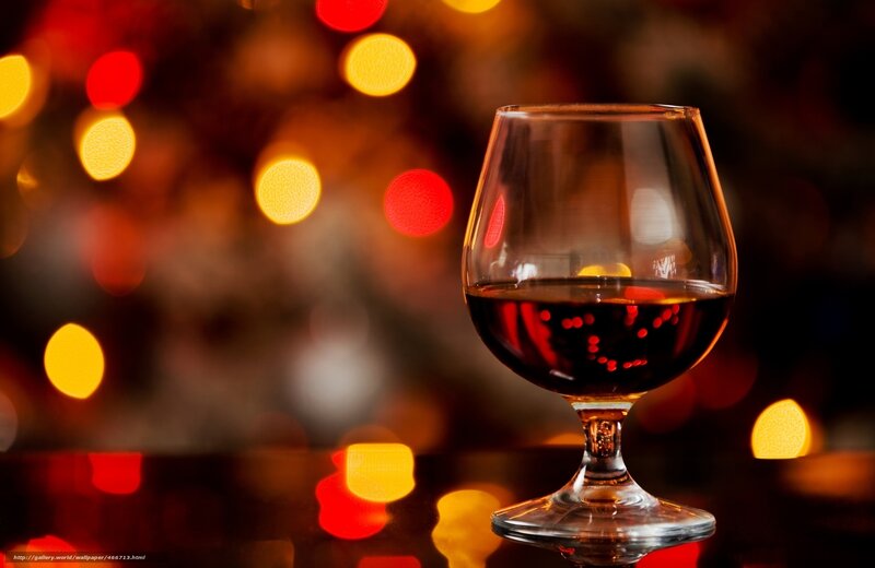 Brandy glass with bokeh lights