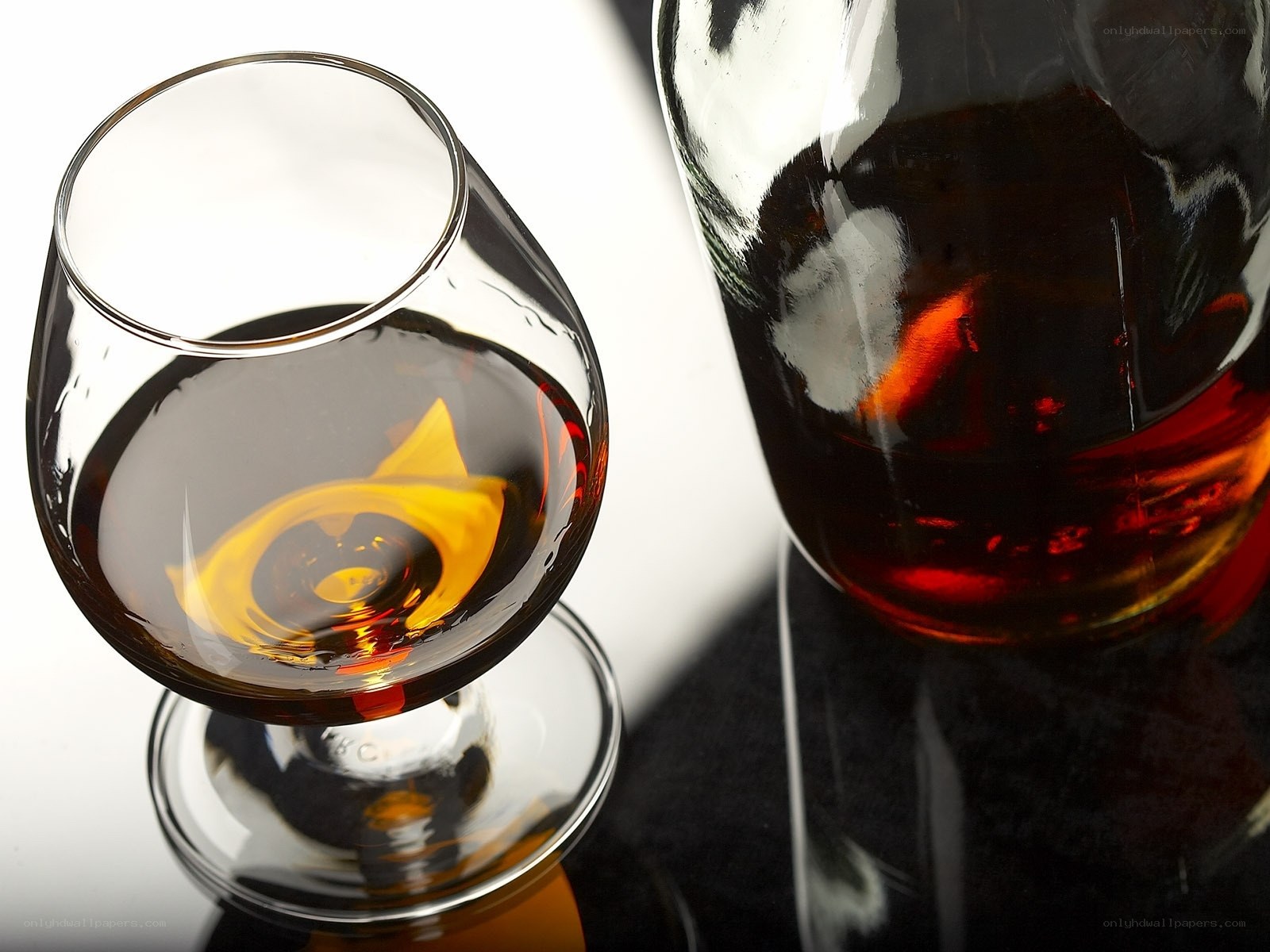 Brandy in glass and bottle
