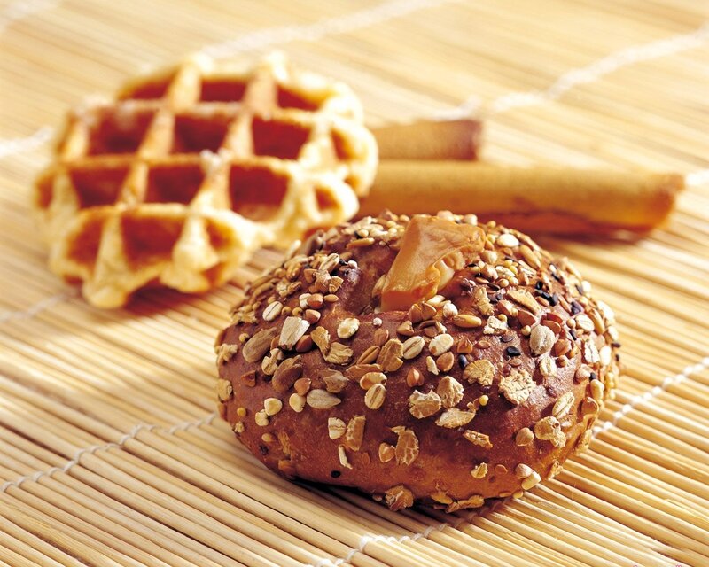 Bread and waffle on mat