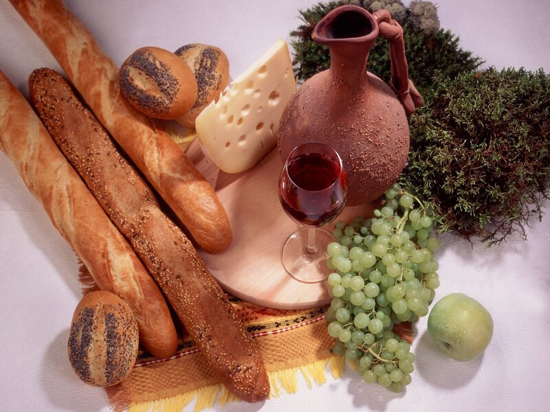 Bread, cheese, and wine arrangement