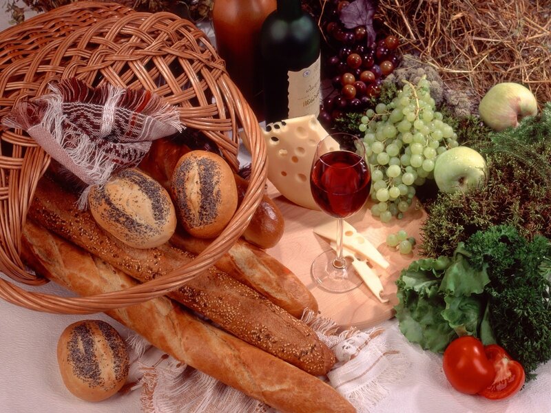 Bread, cheese, and wine spread