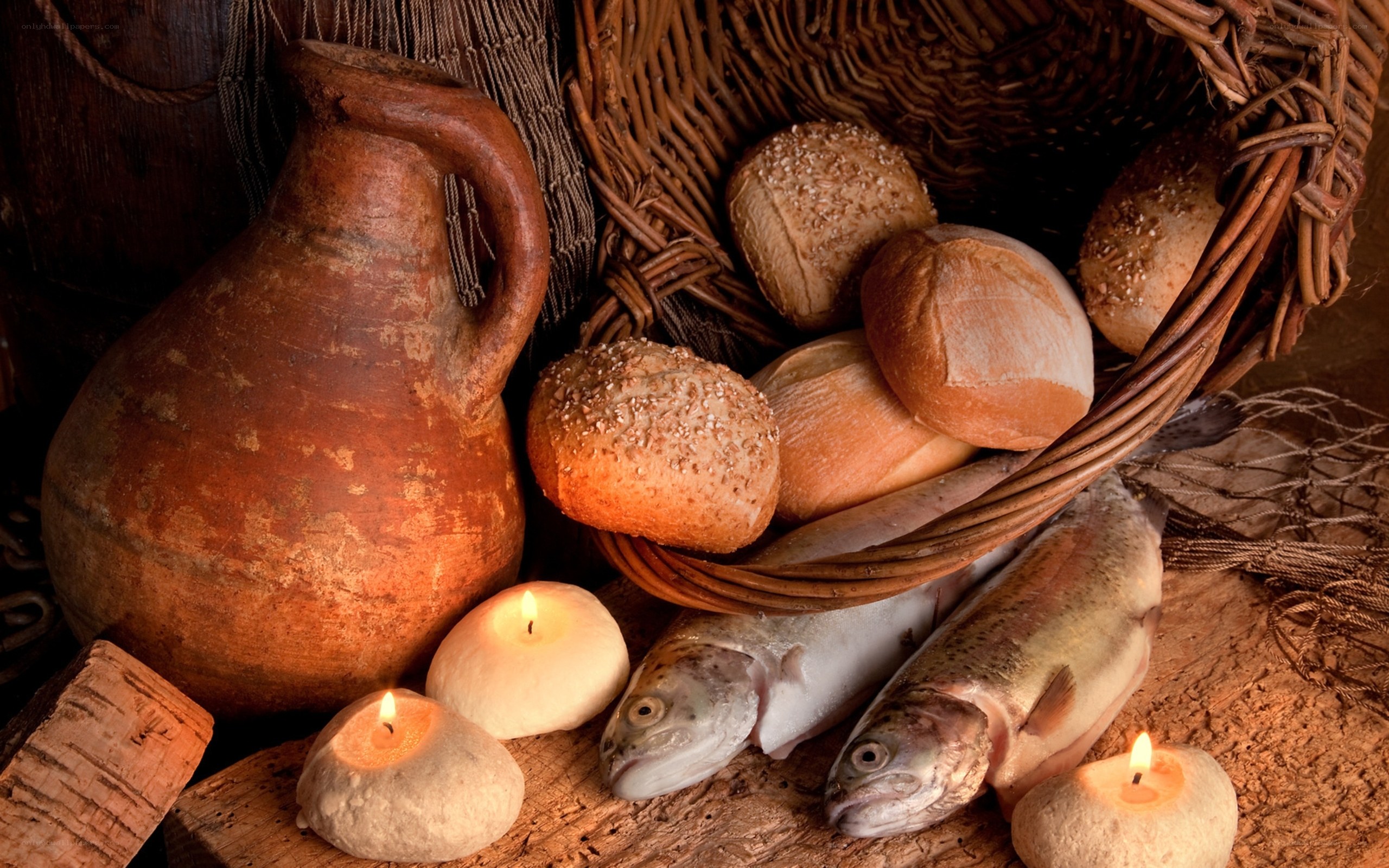 Bread, fish, and candles still life