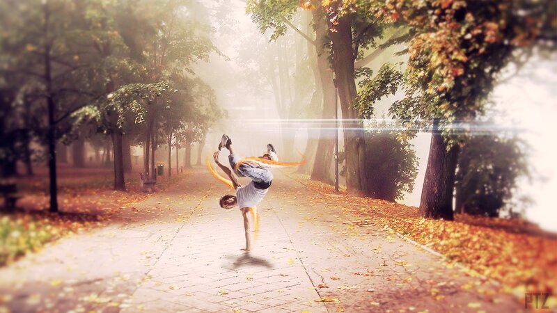 Breakdancer in autumn park